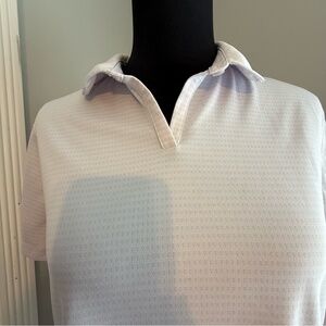 Nike womens Victory DriFit textured golf polo size large

EUC. Lilac and White